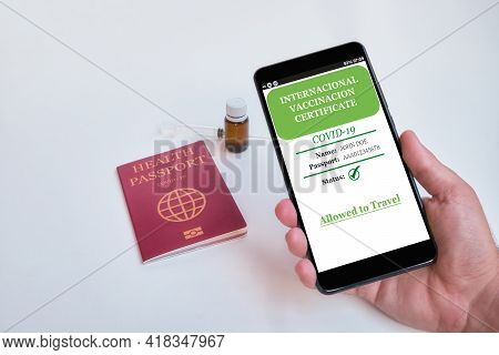 Smartphone With Valid Digital Vaccination Certificate Covid-19.inmunity Passport, Health And Surveil