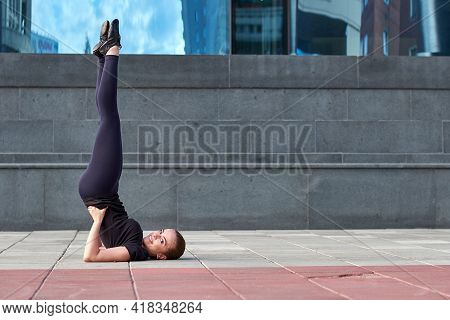 Stretching Fit Or Dancer Or Fitness Woman Doing Exercise