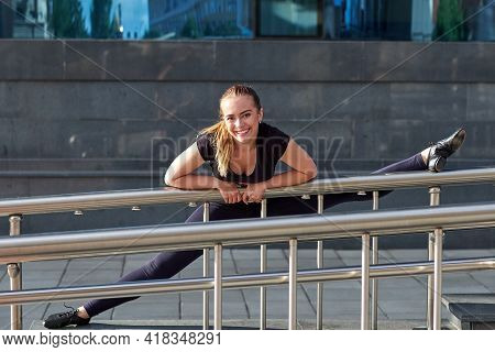 Stretching Fit Or Dancer Or Fitness Woman Doing Exercise