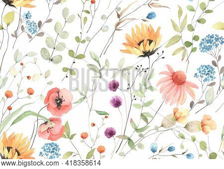 Summer wildflowers, floral seamless pattern with colorful flowers and abstract green plants on white background. Delicate watercolor print for textile, wallpapers or wrapping paper.