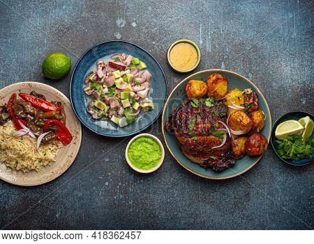 Set Of Assorted Dishes Of Peruvian Cuisine: Beef And Peppers Lomo Saltado, Peruvian Ceviche With Fis