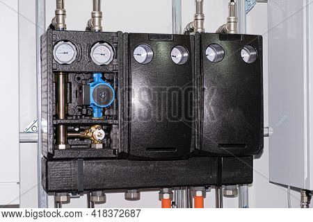 Heating Thermoregulation System. Pump And Sensors. Close-up On A White Background. Business Concept.