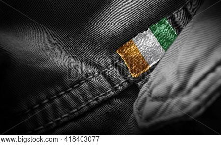Tag On Dark Clothing In The Form Of The Flag Of The Cote Divoire