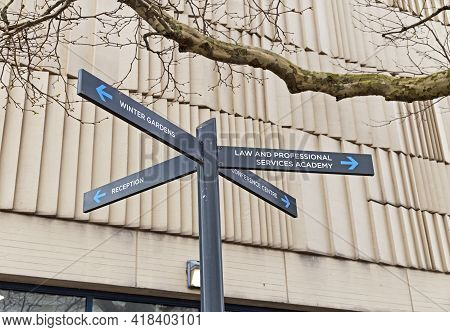 Weston-super-mare, Uk - April 9, 2021: A Sign Giving Directions To Various Departments Of Weston Col