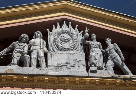 Ust-kamenogorsk, Kz - April 9, 2021. Sculpture Of Metallurgists. Palace Of Culture Of Metallurgists.