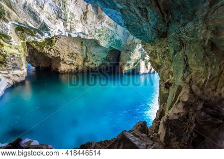  Karst cave Rosh-a-Nikra on the shores of the Mediterranean Sea. Israel. The color of sea water changes from azure to dark blue. The concept of active, environmental and photo tourism