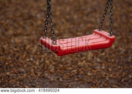 Closeup Red Swing In The Rain, Rainy Weather