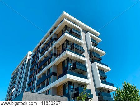 Modern Residential Building With Flats. Contemporary Multi Store Architecture  Planned For Dwellings