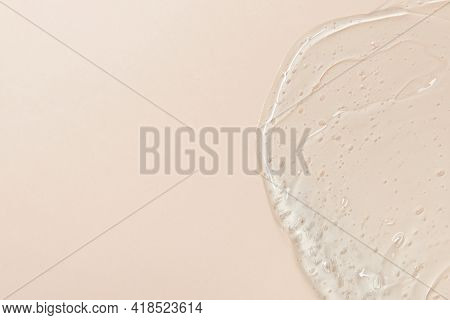 Abstract Cosmetic Gel Background From Transparent Antiseptic Or Hyaluron With Copy Space