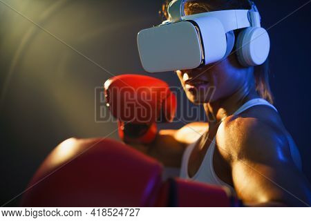 Medium Close Up Shot Of Asian Woman Wearing Vr Headset To Exercise With Simulation Boxing Games, You