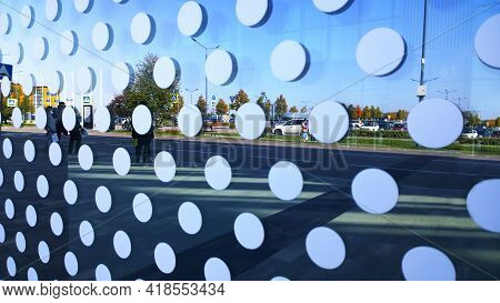St. Petersburg, Russia - September, 2020: Glass Wall Of Modern Building With White Circles Geometry 