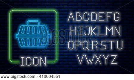 Glowing Neon Pet Carry Case Icon Isolated On Brick Wall Background. Carrier For Animals, Dog And Cat