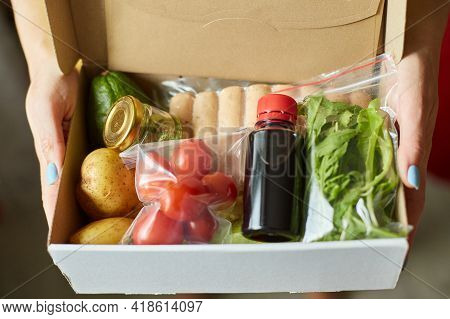 Woman Hold In Hand Food Box Meal Kit Of Fresh Ingredients Order From A Meal Kit Company