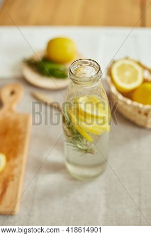 Glass Bottle Detox Healthy Water With Lemon And Rosemary