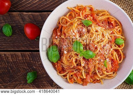 Spaghetti Alla Amatriciana With Guanciale, Tomatoes And Pecorino Cheese. Italian Healthy Food. Top V