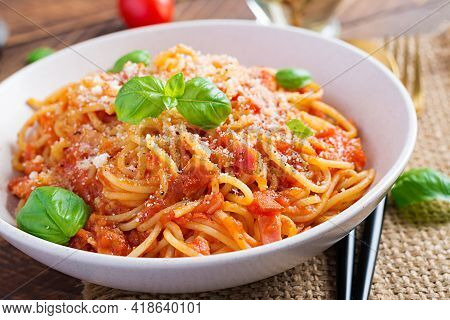 Spaghetti Alla Amatriciana With Guanciale, Tomatoes And Pecorino Cheese. Italian Healthy Food.