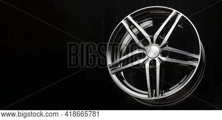New Black Alloy Wheel Sports Car In The Shape Of A Five-pointed Star. Long Layout For The Site Heade