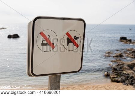 Sign On The Beach. Smoking And Dogs Forbidden. Restrictions On The Beach In Summer