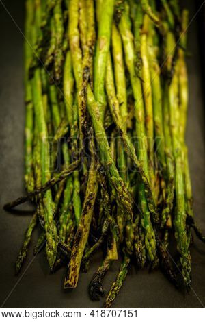 Char-grilled Green Asparagus In Retail Display At Local Market