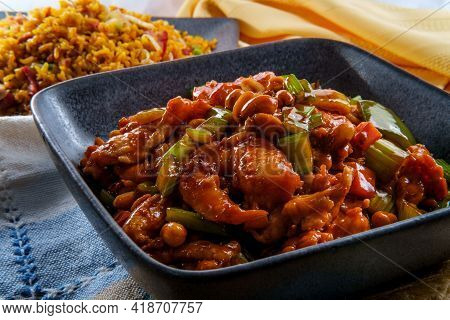 Takeout Chinese Kung Pao Chicken And Shrimp With Peanuts And Side Of Pork Fried Rice