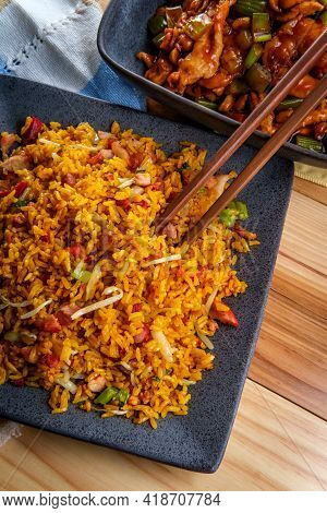 Takeout Chinese Kung Pao Chicken And Shrimp With Peanuts And Side Of Pork Fried Rice