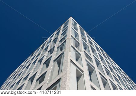 Low Angle View Of A Modern Office Building Facade In Rotkreuz, Switzerland