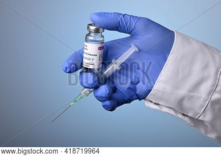 Krasnoyarsk, Russia. April 27, 2021. Doctor Hand Holds Russian Sputnik-v Covid-19 Vaccine Set. Sputn