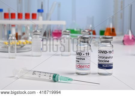 Krasnoyarsk, Russia. April 27, 2021. American Moderna Covid-19 Vaccine Vials On A Lab Desk. Chemical