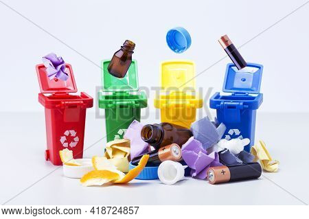 Waste Sorting Recycling Concept.  Toy Garbage сontainers For Separate Waste Collection.