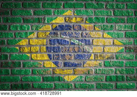National Flag Of Brazil
 Depicting In Paint Colors On An Old Brick Wall. Flag  Banner On Brick Wall 