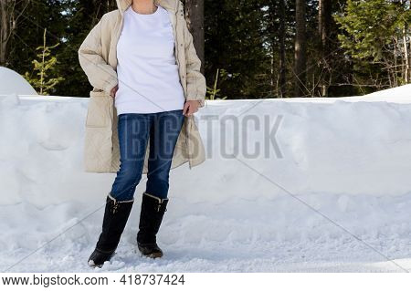 White Sweatshirt Mockup Of A Girl In Quilted Snow Boots, Model Mockup