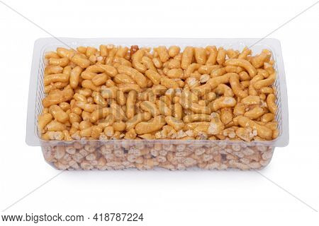 Chak-Chak with honey in plastic transparent box isolated on white background