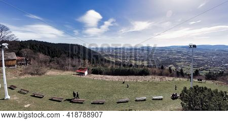 Krakow, Poland - March 28, 2021: Panorama Shot View Of Polish Mountains , Traditional Houses On Moun