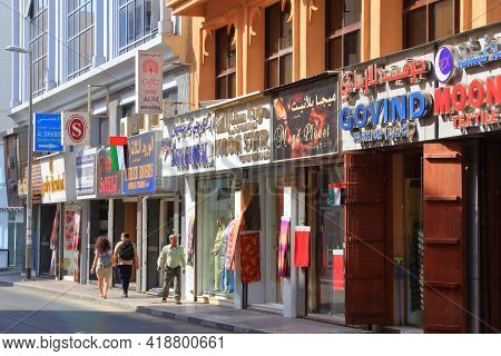 Dubai, Uae - December 9, 2017: People Visit Shopping Street In Al Souk Al Kabir District Of Dubai, U