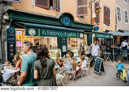 Annecy, France - Aug 15, 2017: People At The Terrace Of La Fabbrica Di Gelato Ice Cream Factory Cafe