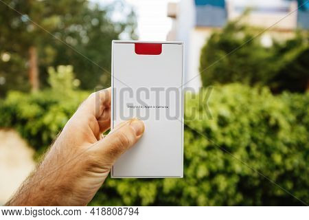 Paris, France- May 19, 2020: Pov Male Hand Holding New Latest Apple Computers Iphone Se Special Edit