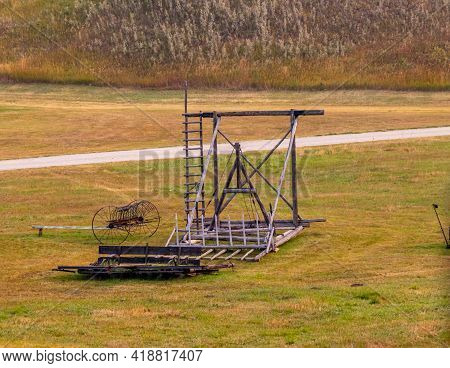 Rustic Farm Buildings And Equipment. Bar U Ranch National Historic Site, Alberta, Canada
