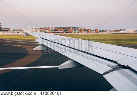 Landing On The Runway. View From The Porthole