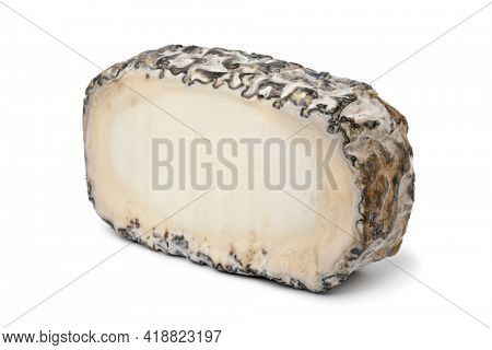 Slice of  Spanish Monte Enebro artisan cheese close up isolated on white background