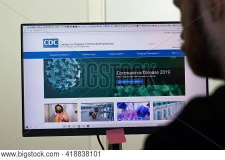 New York, Usa - 26 April 2021: Cdc Website Page On Screen, Man Using Service, Illustrative Editorial