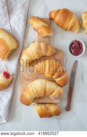 Sweet Home Made Croissants  On A Breakfast Table