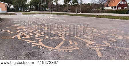Vastervik, Sweden - April 02 2021: Street Art On The Asphalt