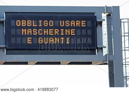 Variable Message Panel With The Big Text Which Means The Obligation To Use Masks And Gloves In Itali
