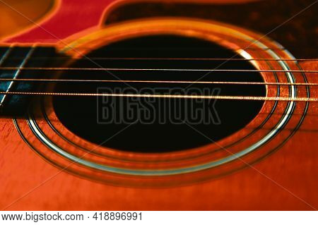 Acoustic Guitar Soundhole And Six Strings . Part Of Wooden Guitar