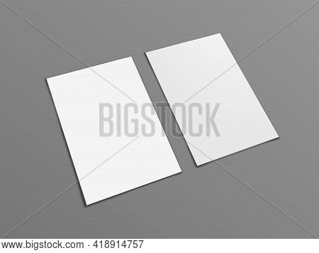 Two Blank Portrait A4 White Paper Isolated On Gray