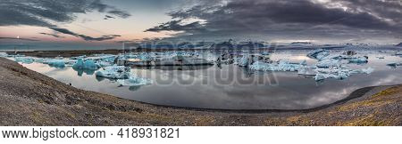 Spectacular Glacier Lake Panorama In Iceland At Dusk