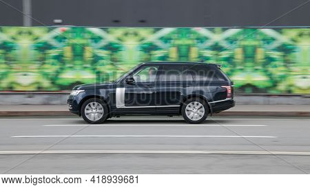 Moscow, Russia - April 2021: Fast Moving Suv Rides On A City Road. Premium Range Rover L405 Car On T