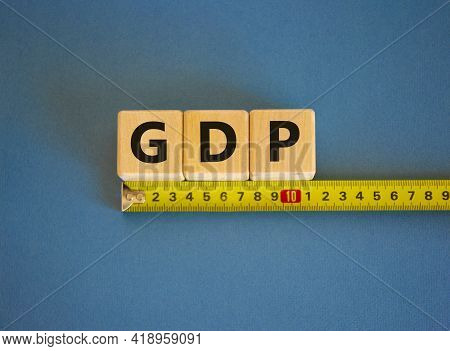 Gdp, Gross Domestic Product Symbol. The Word Gdp, Gross Domestic Product On Cubes Arranged Behind Th