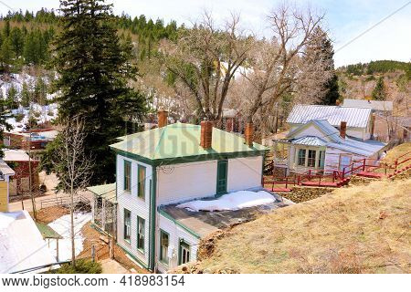 Homes Surrounded By A Temperate Forest Taken On A Mountainous Plateau At The Former Mining Town Of C