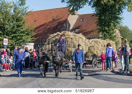 Nieuwehorne, The Netherlands - Sep 28: Farmers With A Traditional Hay-wagon In A Countryside Parade